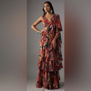 VANA ETHNICS
Rust Georgette Digital Printed Pre-Draped Saree Set